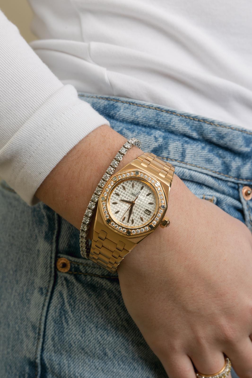 Audemars Piguet Royal Oak watch with diamond-set bezel