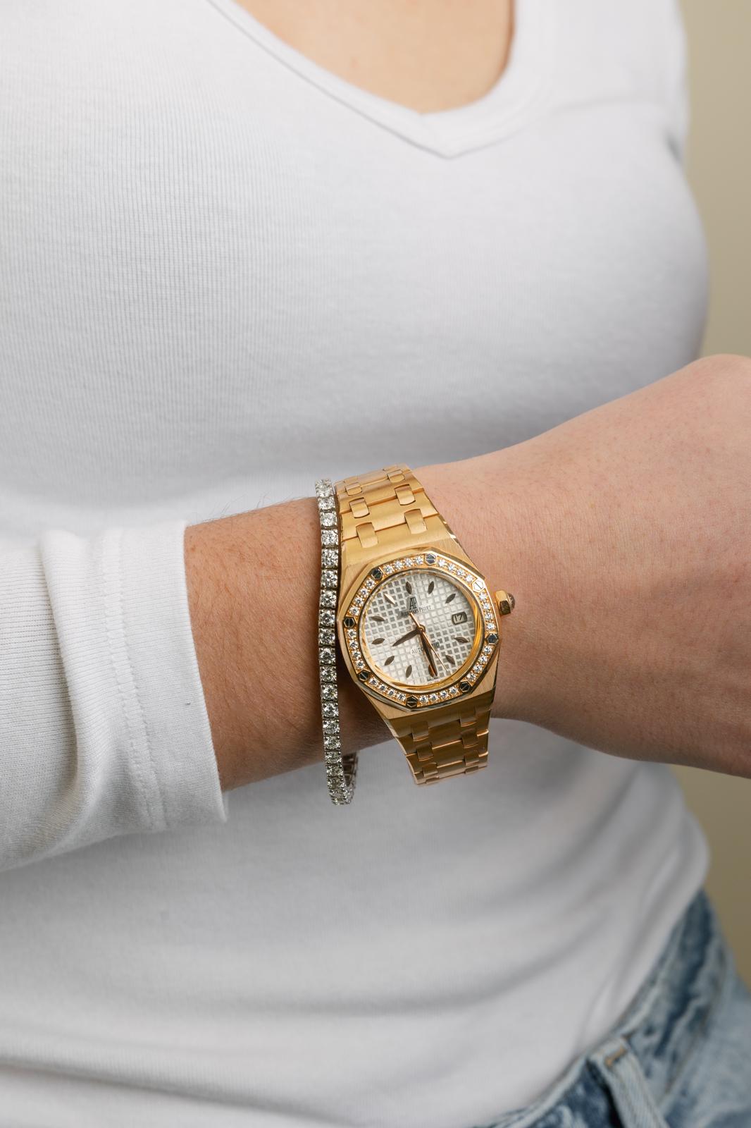 Close wrist view of the diamond-set Audemars Piguet Royal Oak