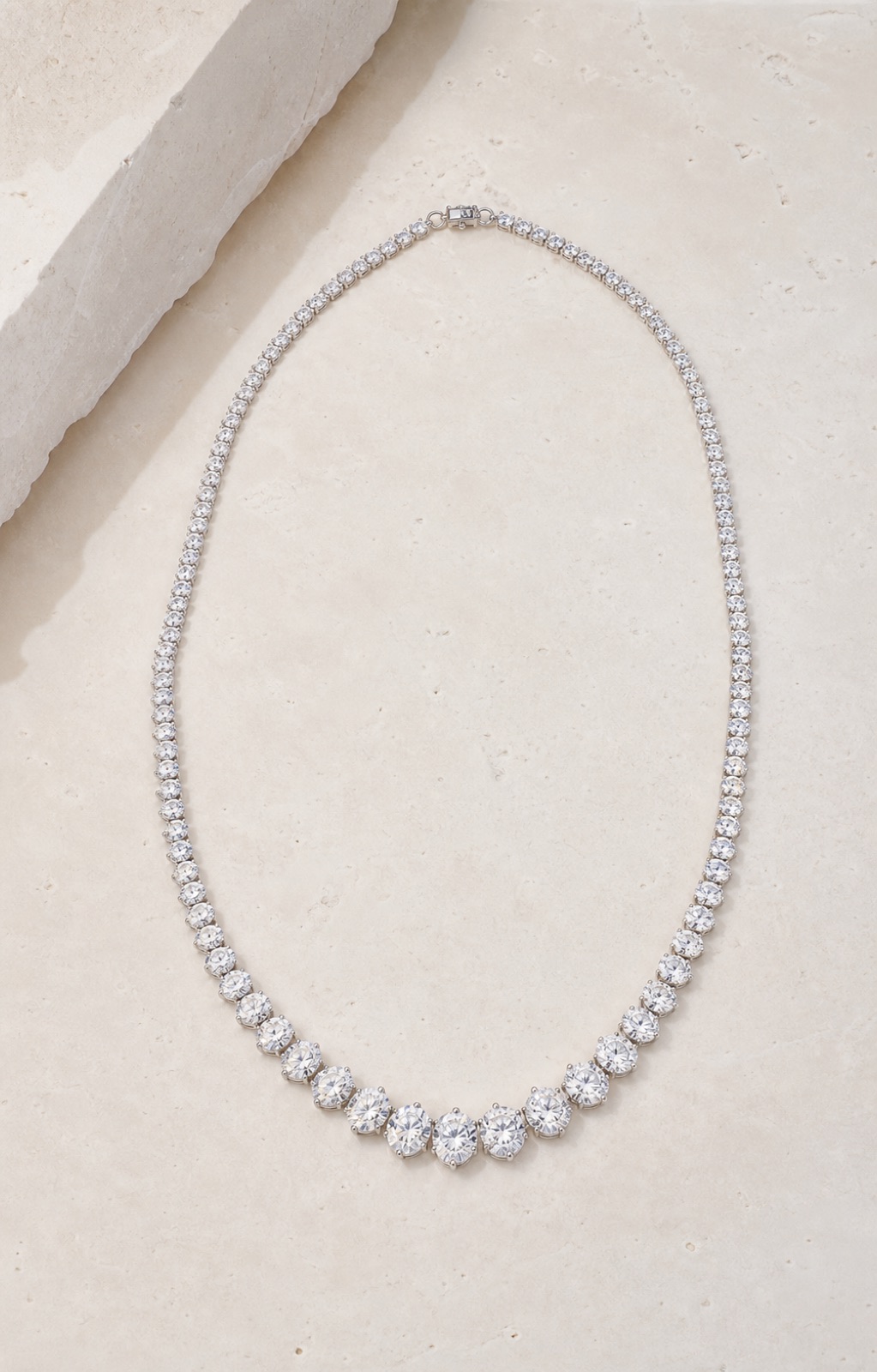 Graduated natural diamond tennis necklace from the estate collection