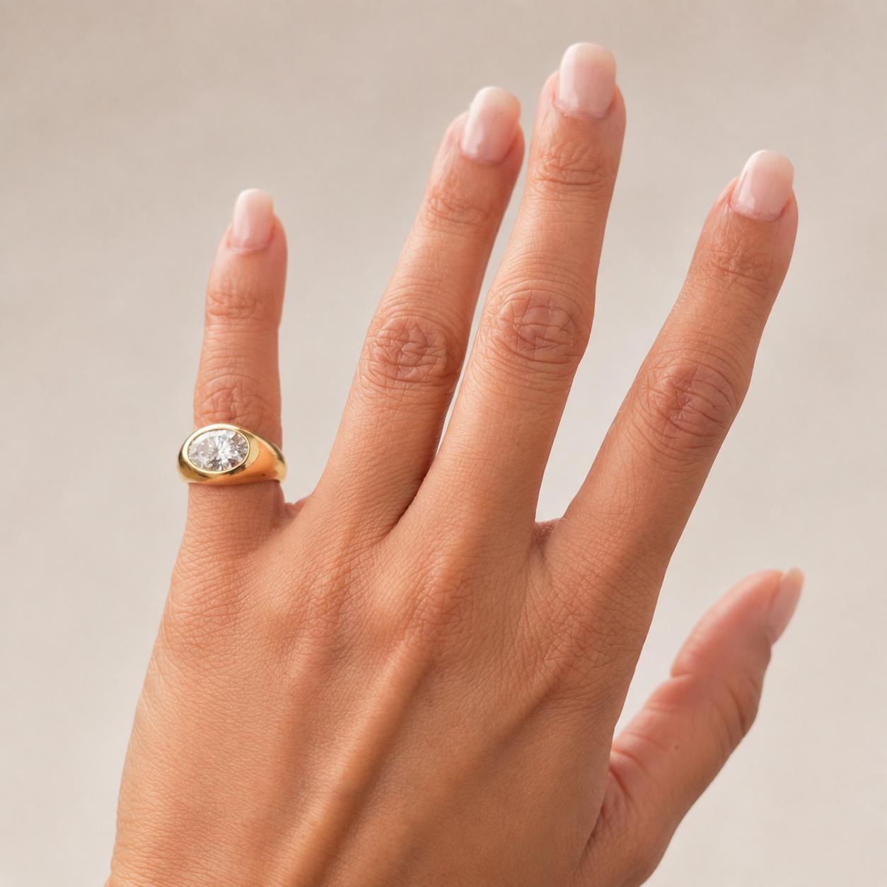 The Rise Ring worn as a personal pinky-ring signature