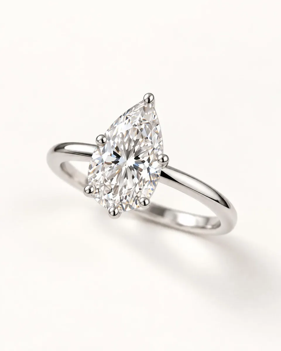 Original three-quarter view of the pear hidden-halo ring