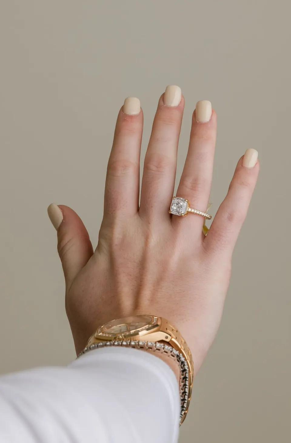 Cushion cut diamond ring worn