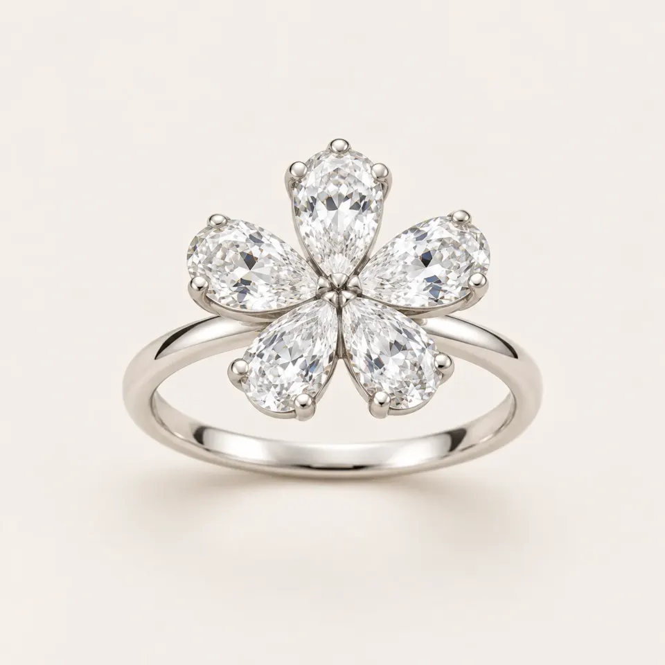 Petals Diamond Ring with five pear-cut diamonds forming a flower on a plain white gold band
